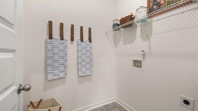 washroom with hookup for a washing machine, tile patterned flooring, and electric dryer hookup