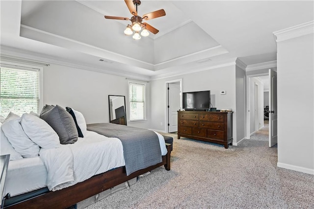 3174 Vickery Dr NE, Marietta, GA 30066 - bedroom featuring a raised ceiling, light colored carpet, baseboards, a ceiling fan, and crown molding