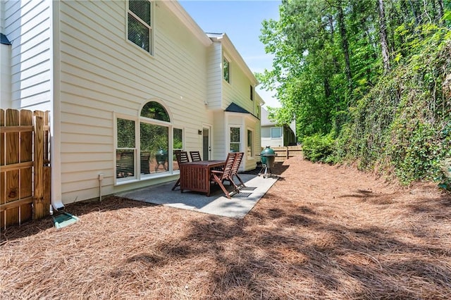 3174 Vickery Dr NE, Marietta, GA 30066 - rear view of house with a patio area and fence