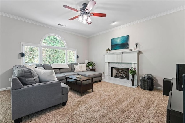 3174 Vickery Dr NE, Marietta, GA 30066 - living room featuring light colored carpet, crown molding, ceiling fan, baseboards, and a premium fireplace