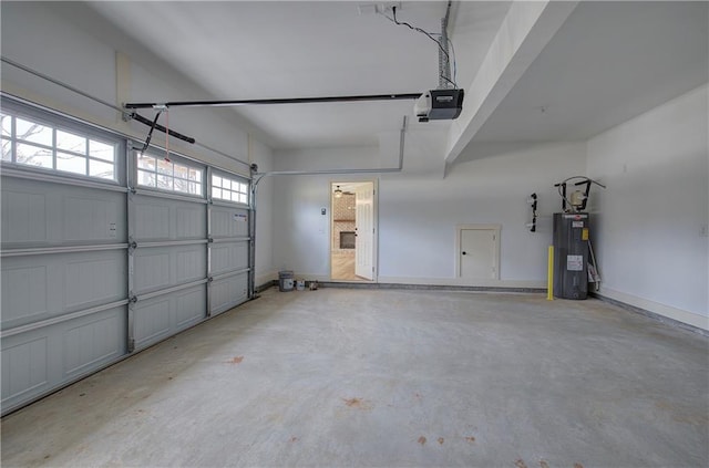 garage with water heater, baseboards, and a garage door opener