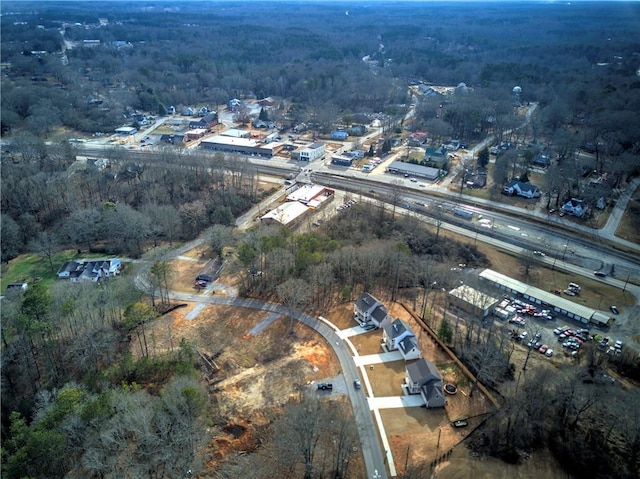 drone / aerial view with a view of trees