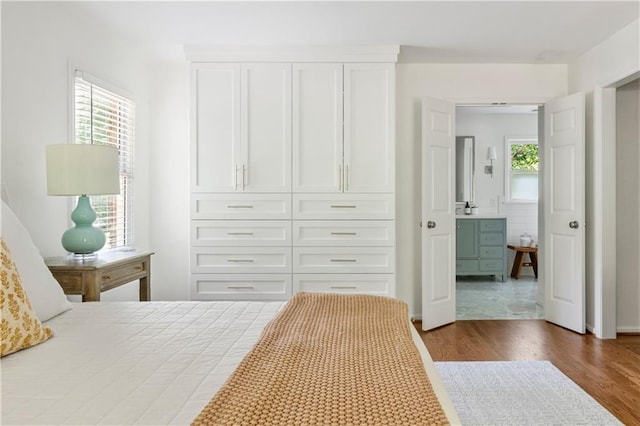 6960 Hunters Branch Dr, Atlanta, GA 30328 - bedroom featuring dark wood finished floors