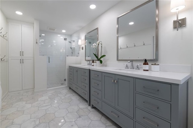 6960 Hunters Branch Dr, Atlanta, GA 30328 - full bath featuring double vanity, a shower stall, recessed lighting, and tile patterned flooring