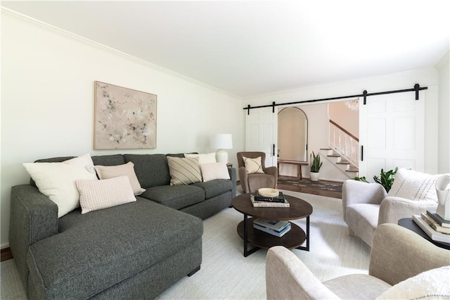 6960 Hunters Branch Dr, Atlanta, GA 30328 - living room featuring a barn door and crown molding