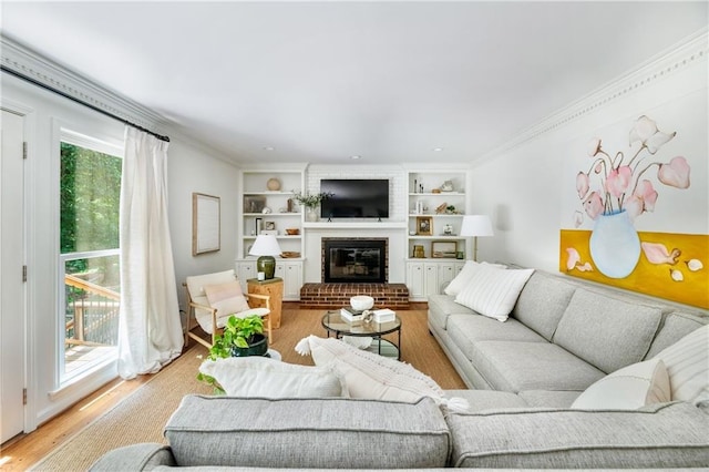 6960 Hunters Branch Dr, Atlanta, GA 30328 - living area with wood finished floors, a fireplace, built in shelves, and ornamental molding