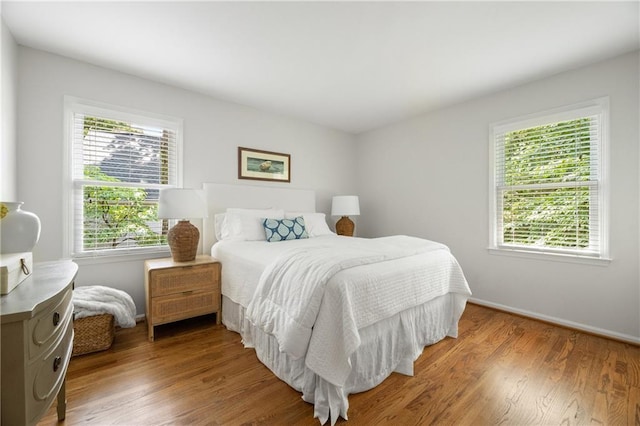 6960 Hunters Branch Dr, Atlanta, GA 30328 - bedroom featuring wood finished floors and baseboards