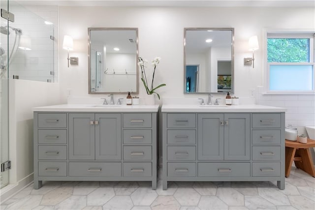 6960 Hunters Branch Dr, Atlanta, GA 30328 - full bath with two vanities, a stall shower, and recessed lighting
