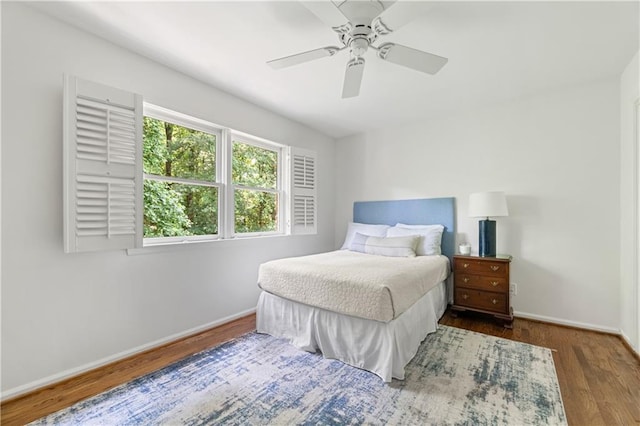 6960 Hunters Branch Dr, Atlanta, GA 30328 - bedroom featuring wood finished floors and ceiling fan