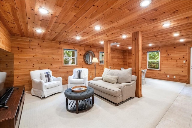 6960 Hunters Branch Dr, Atlanta, GA 30328 - carpeted living room with wooden ceiling, recessed lighting, and wood walls