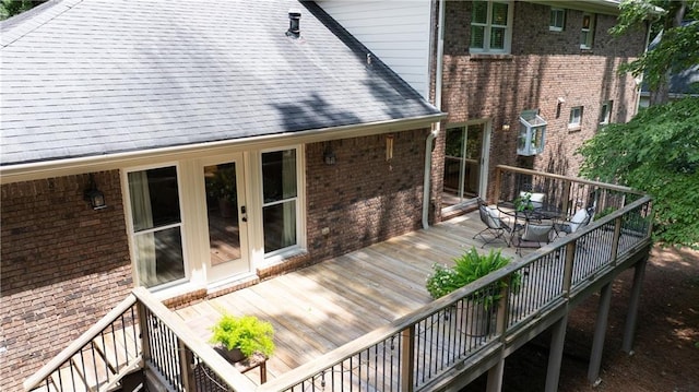 6960 Hunters Branch Dr, Atlanta, GA 30328 - deck with outdoor dining area, stairs, and french doors