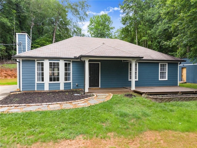 3208 Navajo Cir, Gainesville, GA 30501 - ranch-style house featuring a chimney, a front lawn, a shingled roof, and a porch