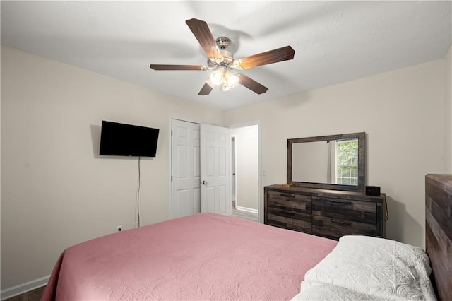 3208 Navajo Cir, Gainesville, GA 30501 - bedroom with baseboards and a ceiling fan