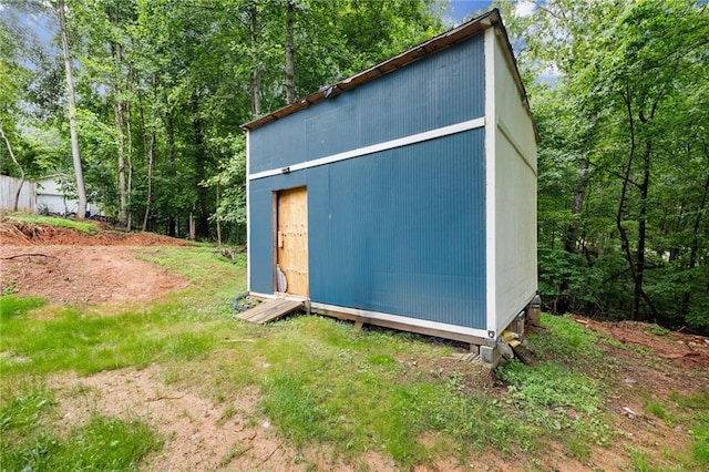 3208 Navajo Cir, Gainesville, GA 30501 - view of outbuilding with a forest view