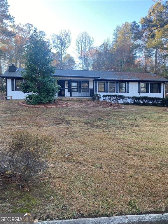 view of front of home with a front yard