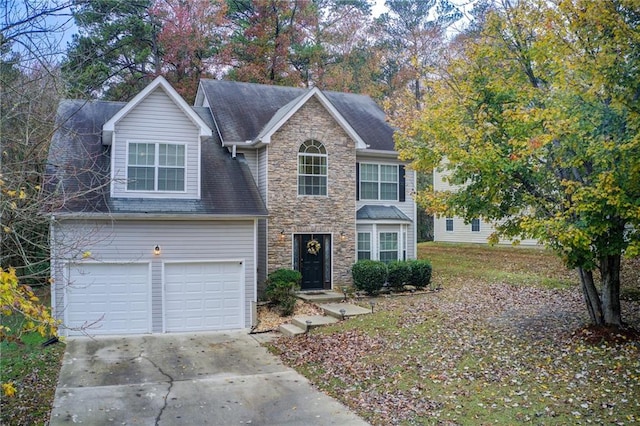 view of front of home with a garage