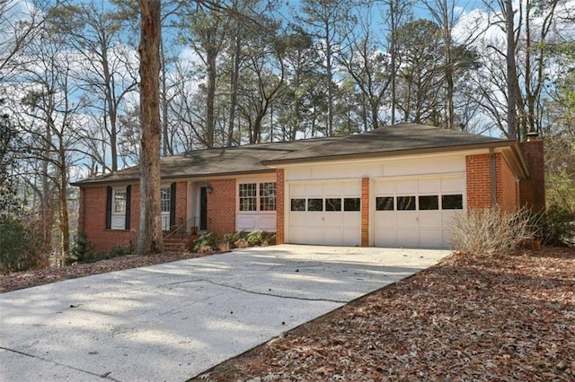 ranch-style home with a garage