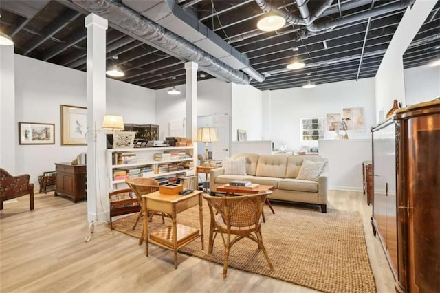 basement featuring light wood-type flooring