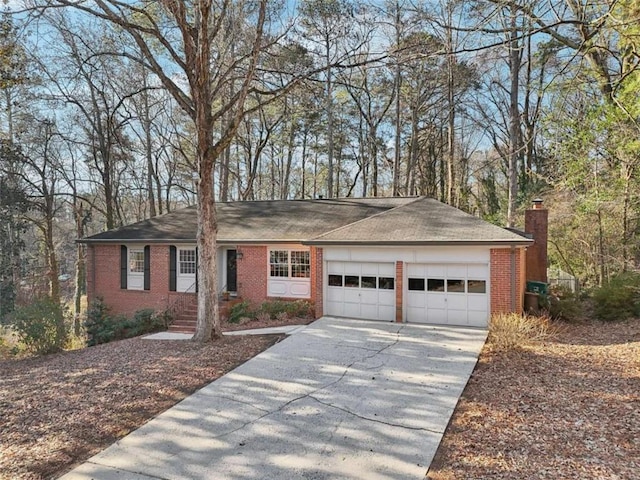 single story home featuring a garage