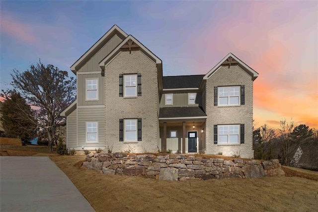 view of front of home with a yard