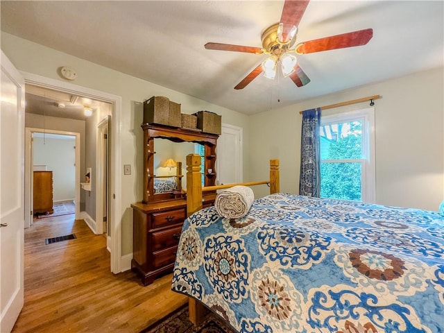 5130 Dearing St, Covington, GA 30014 - bedroom featuring wood finished floors, attic access, and ceiling fan
