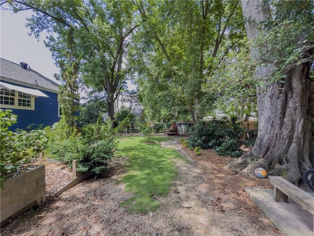 5130 Dearing St, Covington, GA 30014 - view of yard with a garden