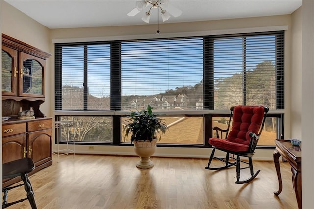 living area featuring light hardwood / wood-style flooring and plenty of natural light