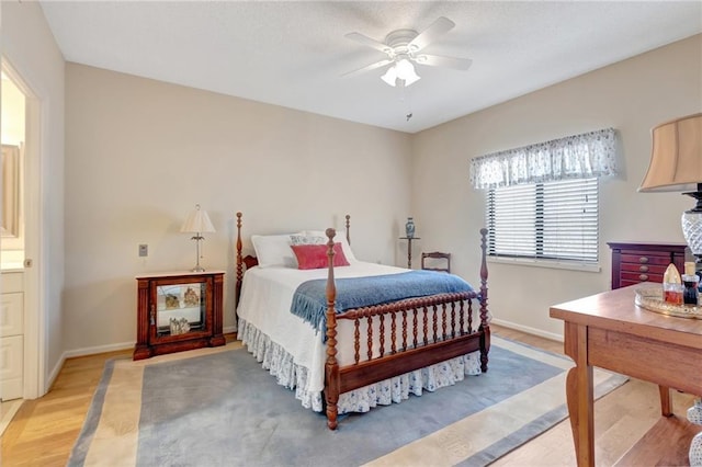 bedroom with hardwood / wood-style floors and ceiling fan