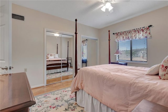 bedroom with ceiling fan and light wood-type flooring