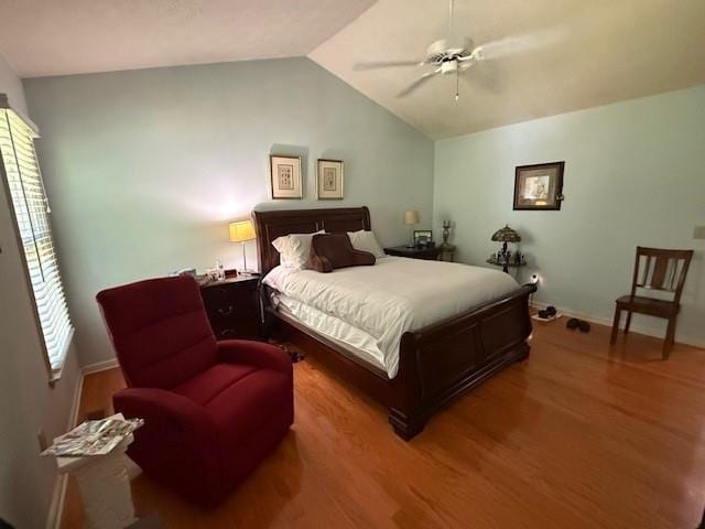 3545 Manchester Dr, Lawrenceville, GA 30044 - bedroom featuring wood finished floors, lofted ceiling, and ceiling fan