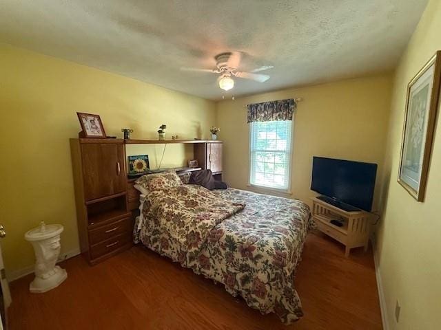 3545 Manchester Dr, Lawrenceville, GA 30044 - bedroom with wood finished floors and a ceiling fan