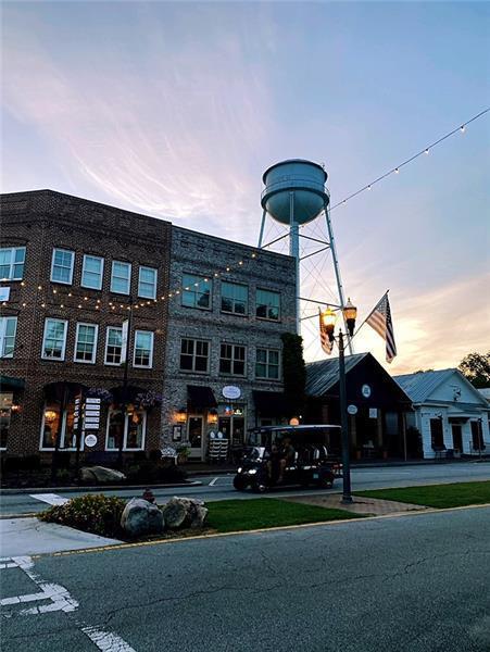 view of outdoor building at dusk