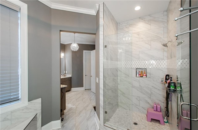 bathroom with ornamental molding, vanity, a shower with door, and a notable chandelier