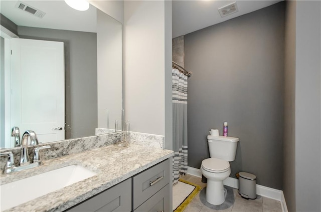 bathroom with vanity, a shower with shower curtain, tile patterned floors, and toilet