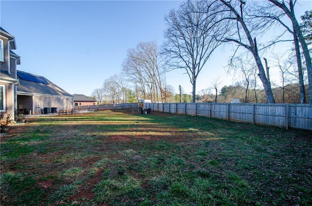 view of yard featuring a fenced backyard