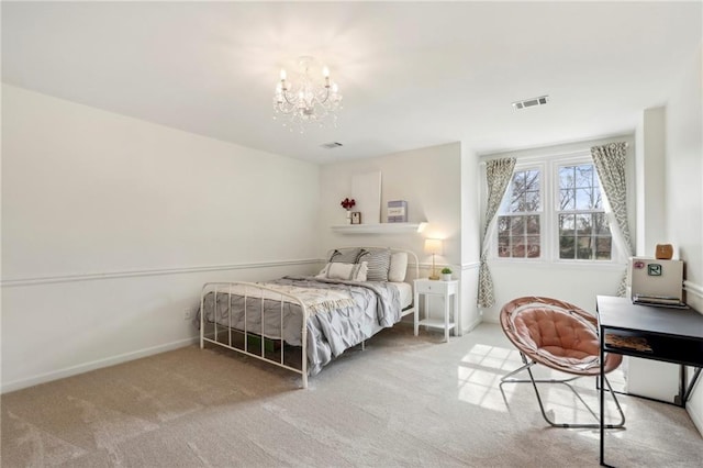 carpeted bedroom with a chandelier, visible vents, and baseboards