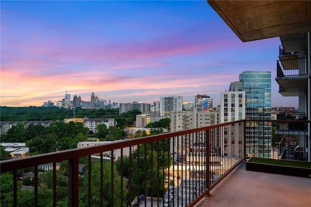 2233 Peachtree Rd NE Unit 1207, Atlanta, GA 30309 - balcony at dusk with a view of city
