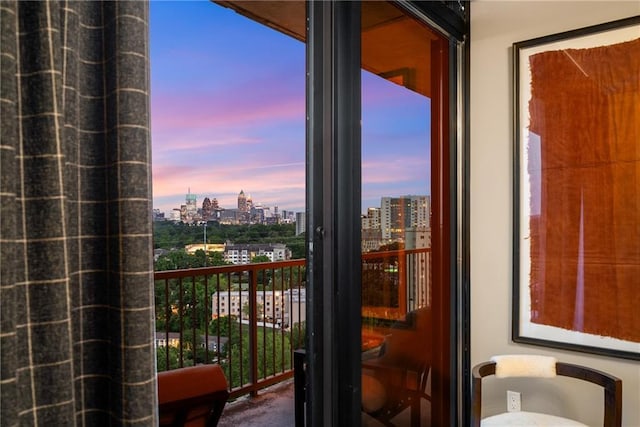 2233 Peachtree Rd NE Unit 1207, Atlanta, GA 30309 - doorway with a city view, plenty of natural light, and carpet floors