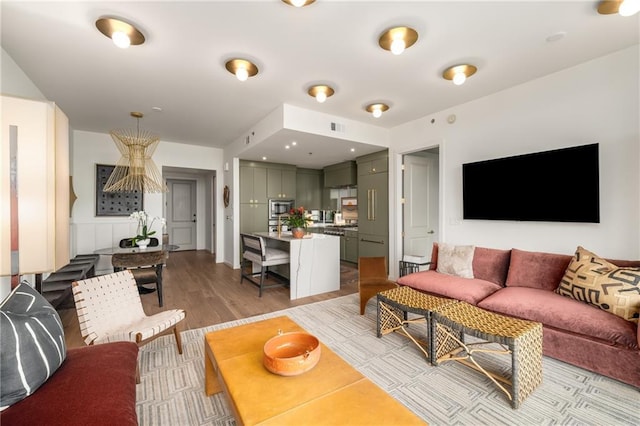 2233 Peachtree Rd NE Unit 1207, Atlanta, GA 30309 - living room with light wood-type flooring
