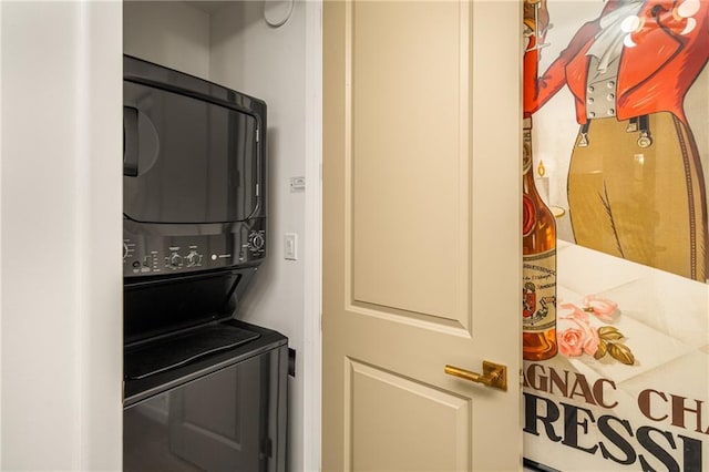 2233 Peachtree Rd NE Unit 1207, Atlanta, GA 30309 - washroom with stacked washer and clothes dryer