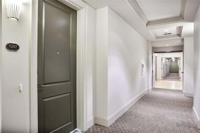 2233 Peachtree Rd NE Unit 1207, Atlanta, GA 30309 - hall with carpet floors, a tray ceiling, and baseboards