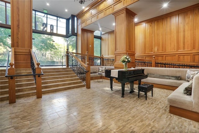 2233 Peachtree Rd NE Unit 1207, Atlanta, GA 30309 - lobby with a decorative wall, stairs, and wood walls
