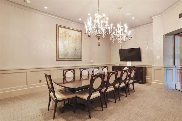 2233 Peachtree Rd NE Unit 1207, Atlanta, GA 30309 - dining room with light colored carpet, a decorative wall, a chandelier, ornamental molding, and wainscoting