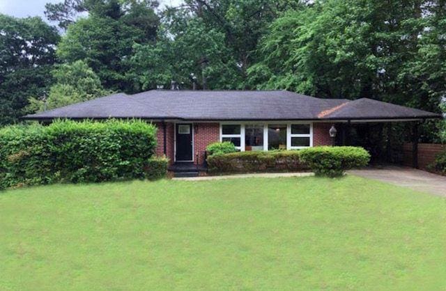 2314 Bryant Dr, Atlanta, GA 30344 - single story home featuring a front yard and a carport