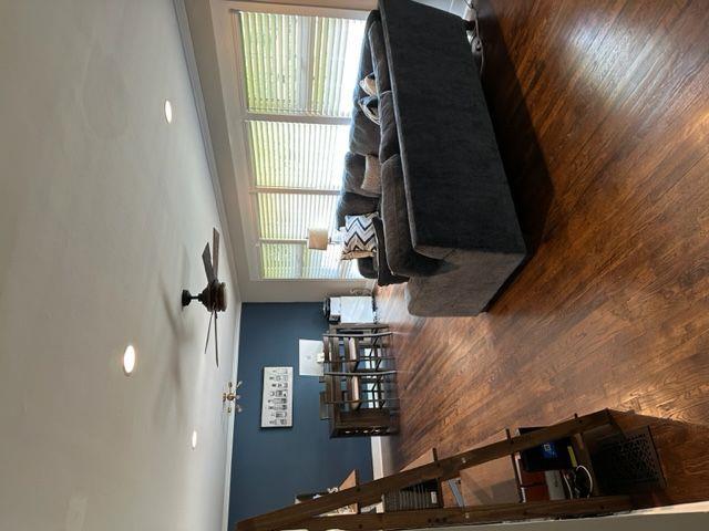 2314 Bryant Dr, Atlanta, GA 30344 - living room featuring wooden walls