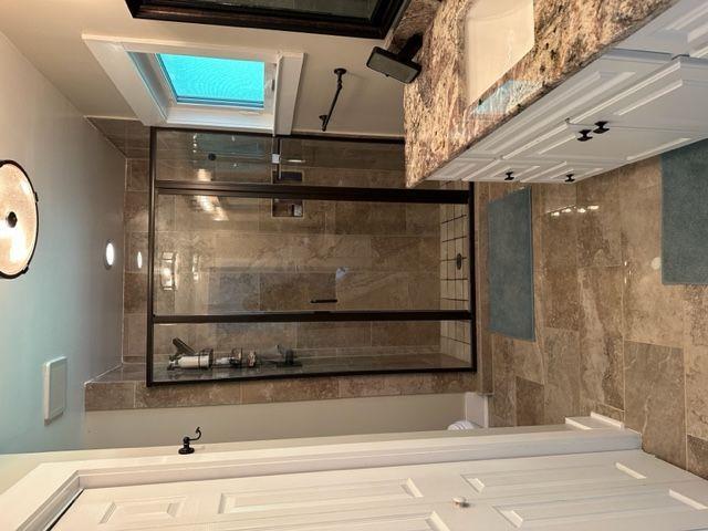 2314 Bryant Dr, Atlanta, GA 30344 - bathroom featuring vanity and a shower with shower door