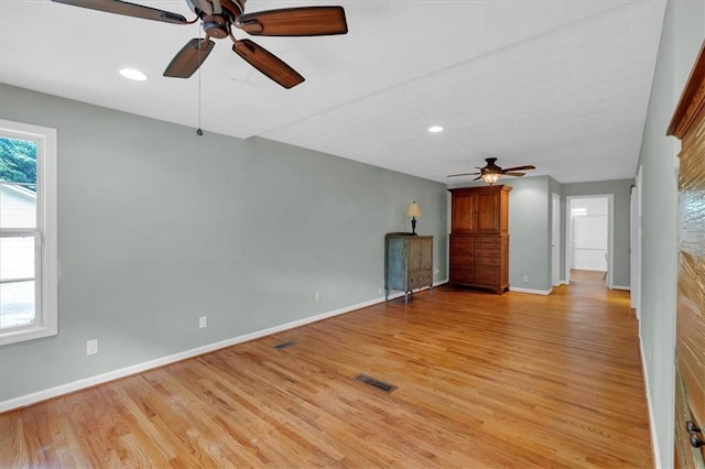 3122 Harmony Rd, Temple, GA 30179 - unfurnished living room with ceiling fan, light wood-style floors, and recessed lighting