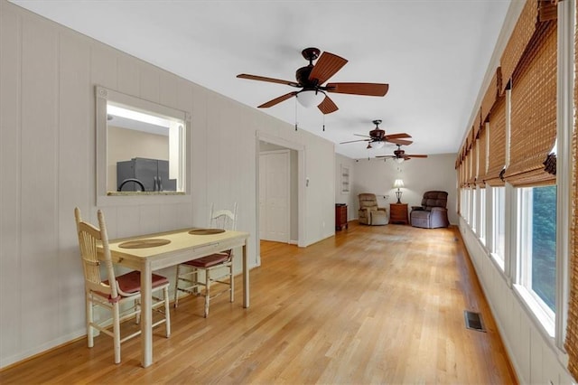 3122 Harmony Rd, Temple, GA 30179 - living area featuring light wood finished floors and a ceiling fan