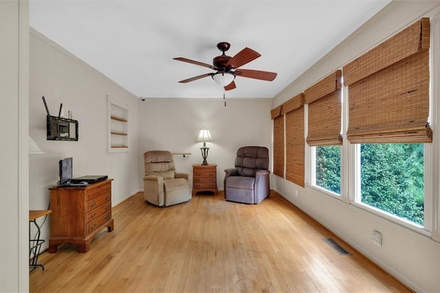 3122 Harmony Rd, Temple, GA 30179 - sitting room with a ceiling fan and light wood-style flooring