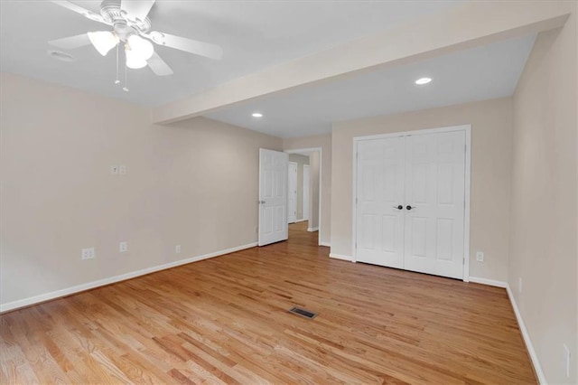3122 Harmony Rd, Temple, GA 30179 - unfurnished bedroom featuring light wood-style flooring, recessed lighting, a ceiling fan, and a closet